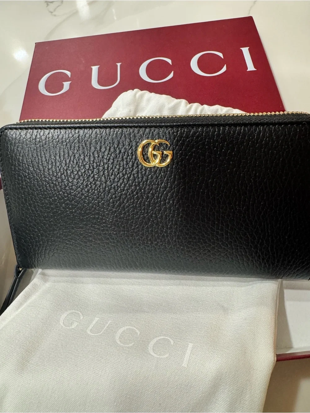 Gucci Black Pebbled Leather Zip Wallet with Gold Logo